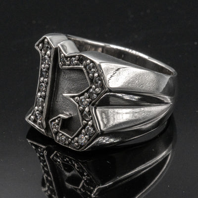 Carved 13 ring made from 925 sterling silver, encrusted in 17 clear  cubic zirconia stones.  Great statement piece, looks great on
