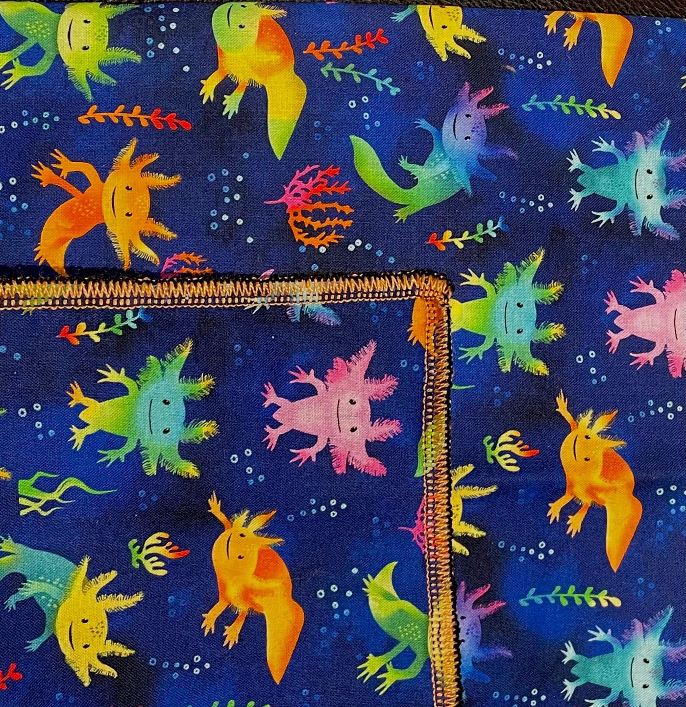 Cute design, bright & vibrant colours in our axolotl bandana made from 100% cotton fabric