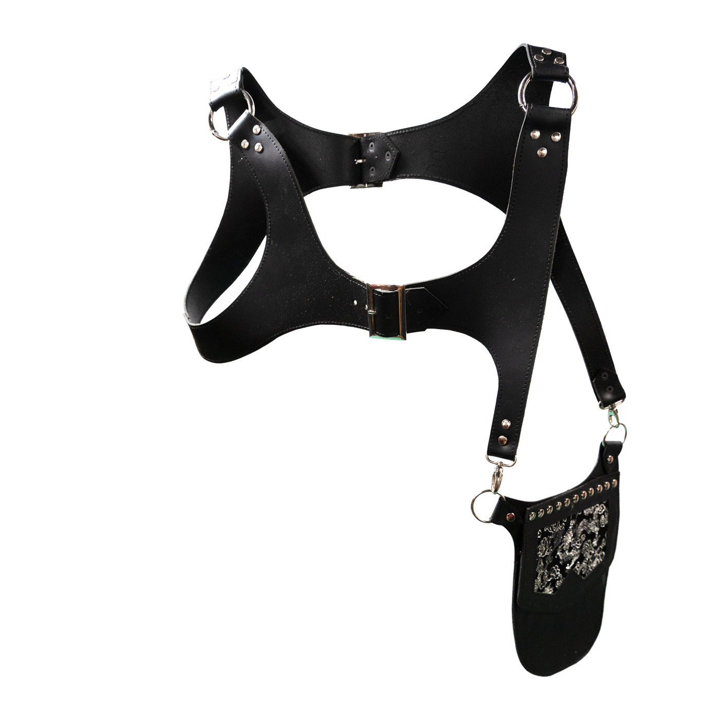 Real Leather back holster to keep your belongings and valuables safe.  It has an adjustable strap with buckles at the front with chrome effect studs in various places, rings that sit on the shoulders and another buckle securing at the back.  on the side is a decorative pouch for your valuables to keep them out of site.  This one has a silver dragon design on the pouch
