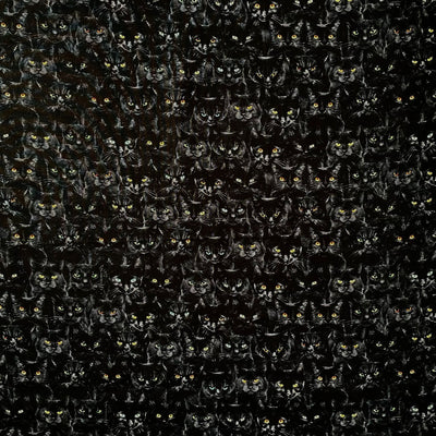 100% cotton fabric with rows of black cats all with different coloured staring eyes
