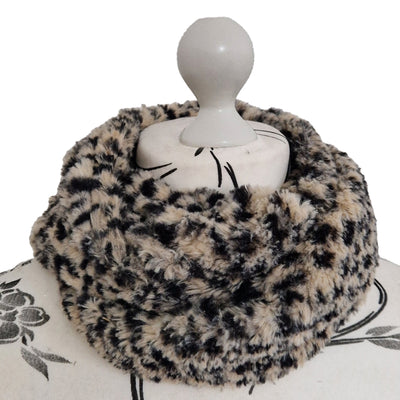 Infinity Scarf handmade from an ultra soft and fluffy leopard faux fur fabric in beige with black markings. Wear it long or wrap it around your neck 2-3 times to keep you toasty warm
