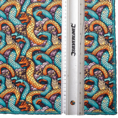 Entwined Chinese dragons cover this bandana which is approx. 21.5 x 21.5". In gorgeous shades of blues & oranges