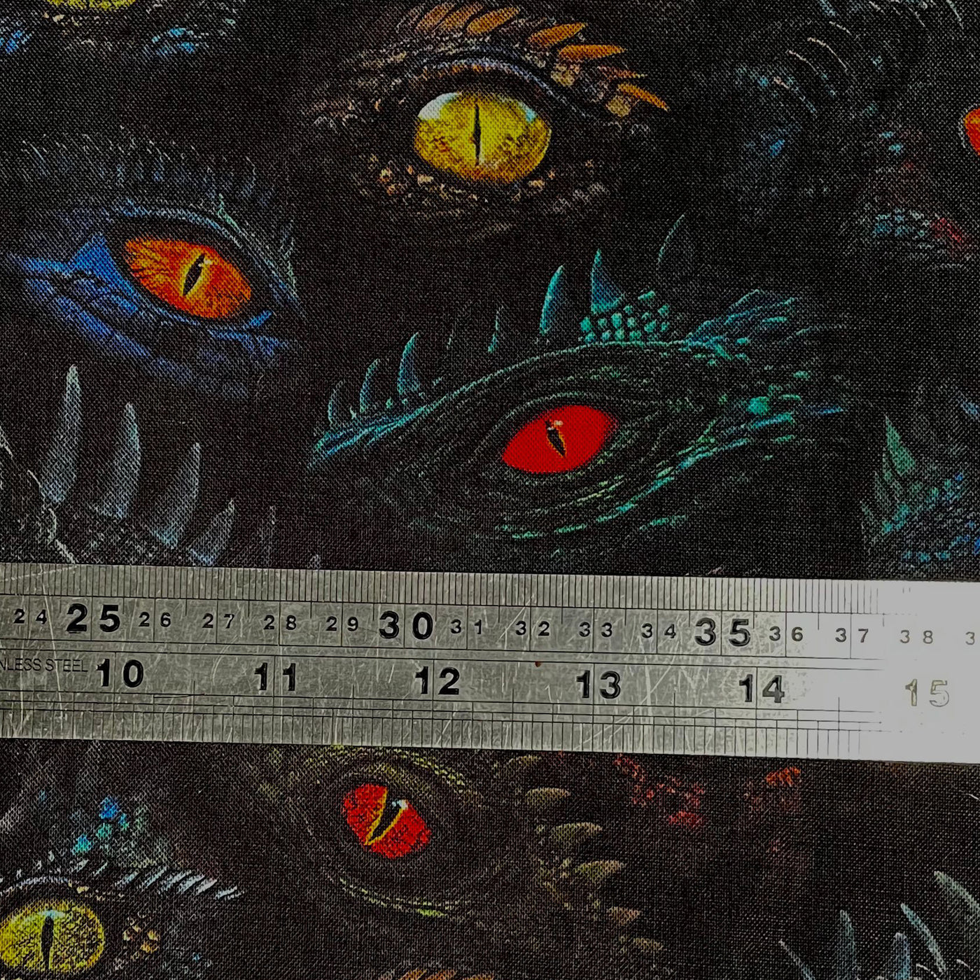 Dragon's eyes in a random overlapping pattern 21" x 21" bandana handmade from 100% cotton