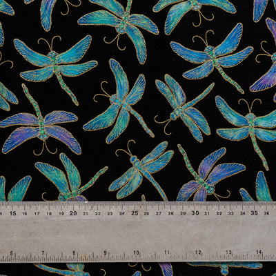 Beautiful 100% cotton fabric with a dragonfly design.  In shades of blues, greens & purples