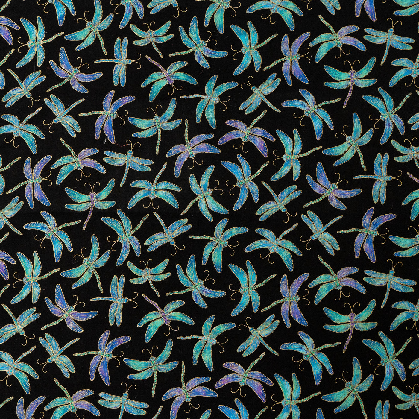 Beautiful 100% cotton fabric with a dragonfly design.  In shades of blues, greens & purples
