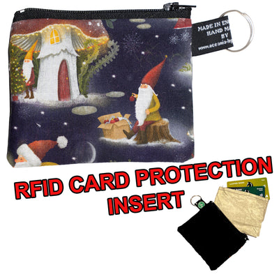 Coin & Card Purse with a lovely Christmas scene with elf/gonks and toadstools  . A snowy nighttime setting with gonks and Santa. Chosen and random Design on one side and black cotton on the reverse.  With an RFID Insert to block scanners
