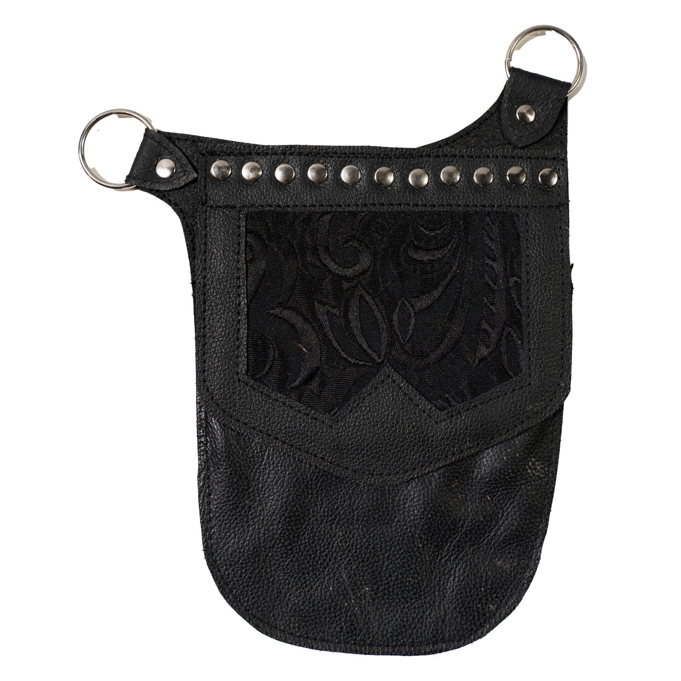 Real Leather back holster to keep your belongings and valuables safe.  It has an adjustable strap with buckles at the front with chrome effect studs in various places, rings that sit on the shoulders and another buckle securing at the back.  on the side is a decorative pouch for your valuables to keep them out of site.  This one has a black brocade design on the pouch
