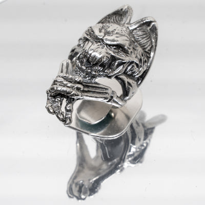 Winged gargoyle ring made from 925 solid sterling ring. Hideous beast with hands crossed and baring teeth, ghoulish character.  Available in sizes M - Z+5.  Please ask for alternative sizes.
