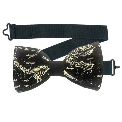 Glow in the dark dinosaur skeletons bow tie. Handmade from Timeless Treasures 100% Cotton