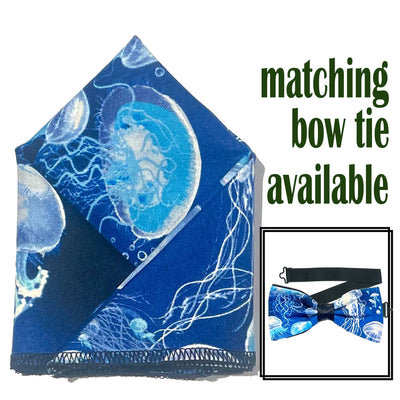 Lovely design with swarms of jellyfish swimming on a sea blue fabric.  Handmade bow tie & pocket square.  The bow tie is on a sliding ribbon to easily attach. The pocket square is  25 cmx 25 cm, pre-tied so just pop it straight in your pocket. Cotton
