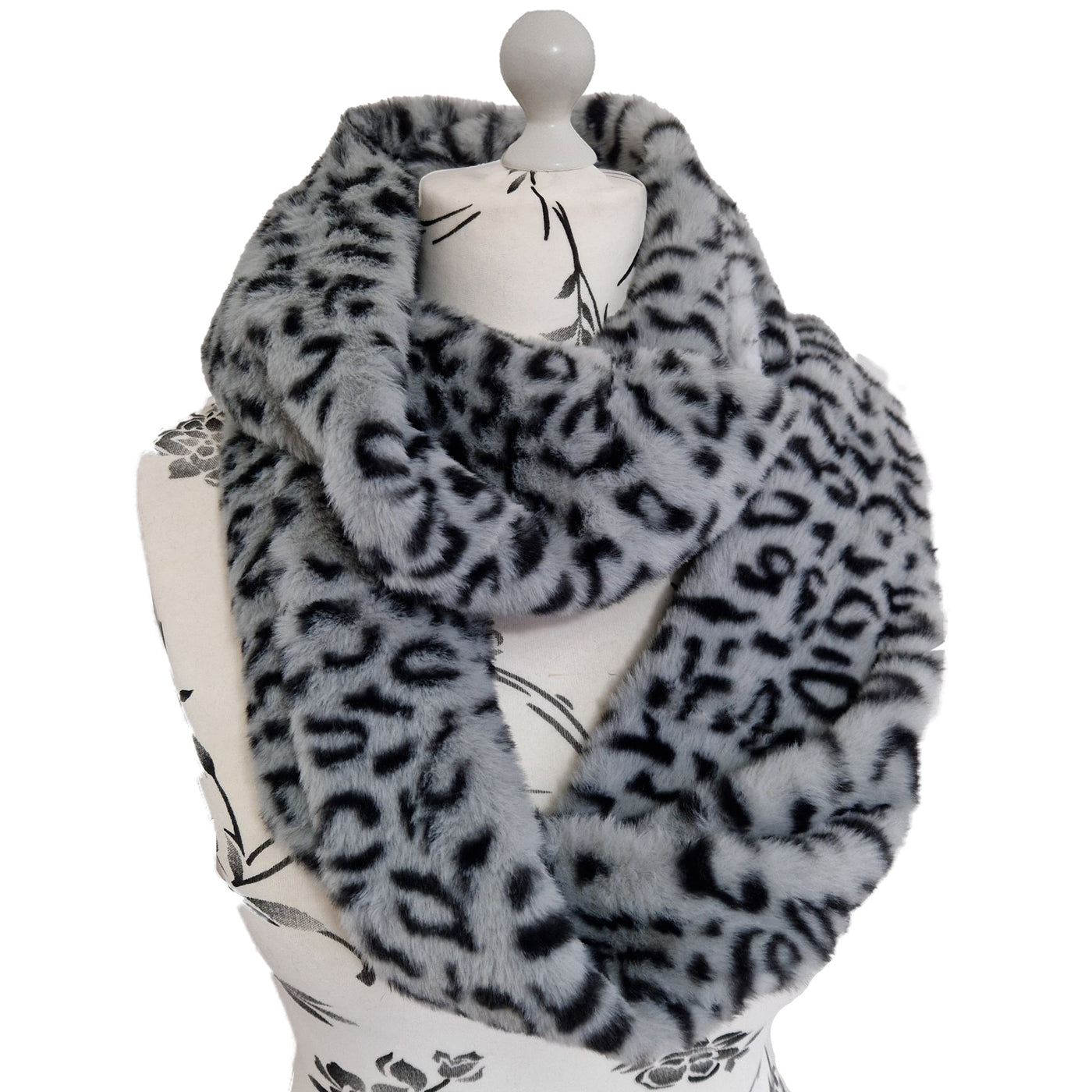 Infinity Scarf handmade from an ultra soft and fluffy leopard faux fur fabric in grey with black markings. Wear it long or wrap it around your neck 2-3 times to keep you toasty warm
