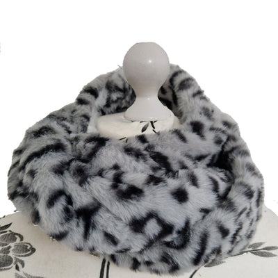 Infinity Scarf handmade from an ultra soft and fluffy leopard faux fur fabric in grey with black markings. Wear it long or wrap it around your neck 2-3 times to keep you toasty warm
