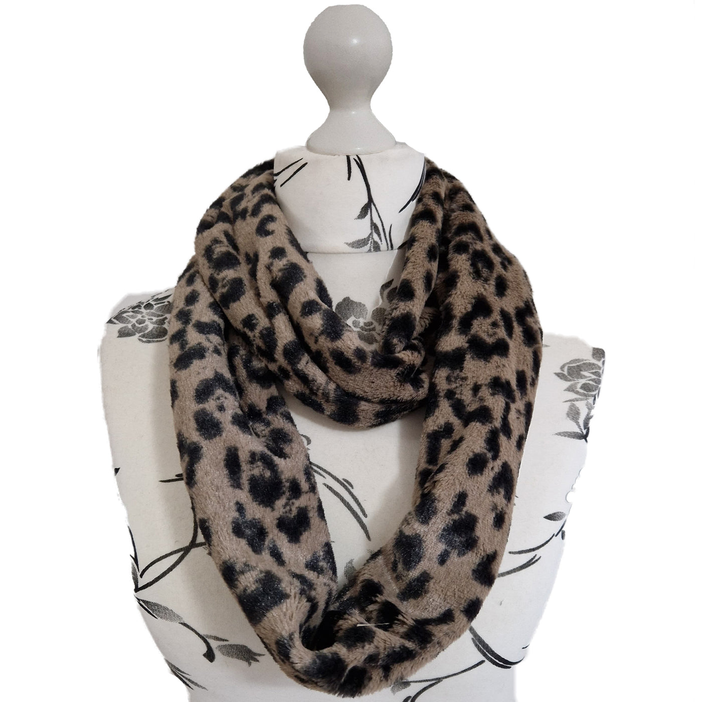 Infinity Scarf handmade from an ultra soft and fluffy microfur leopard print fabric in cream. Wear it long or wrap it around your neck 2-3 times to keep you toasty warm
