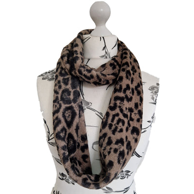 Infinity Scarf handmade from an ultra soft and fluffy microfur leopard print fabric in cream. Wear it long or wrap it around your neck 2-3 times to keep you toasty warm
