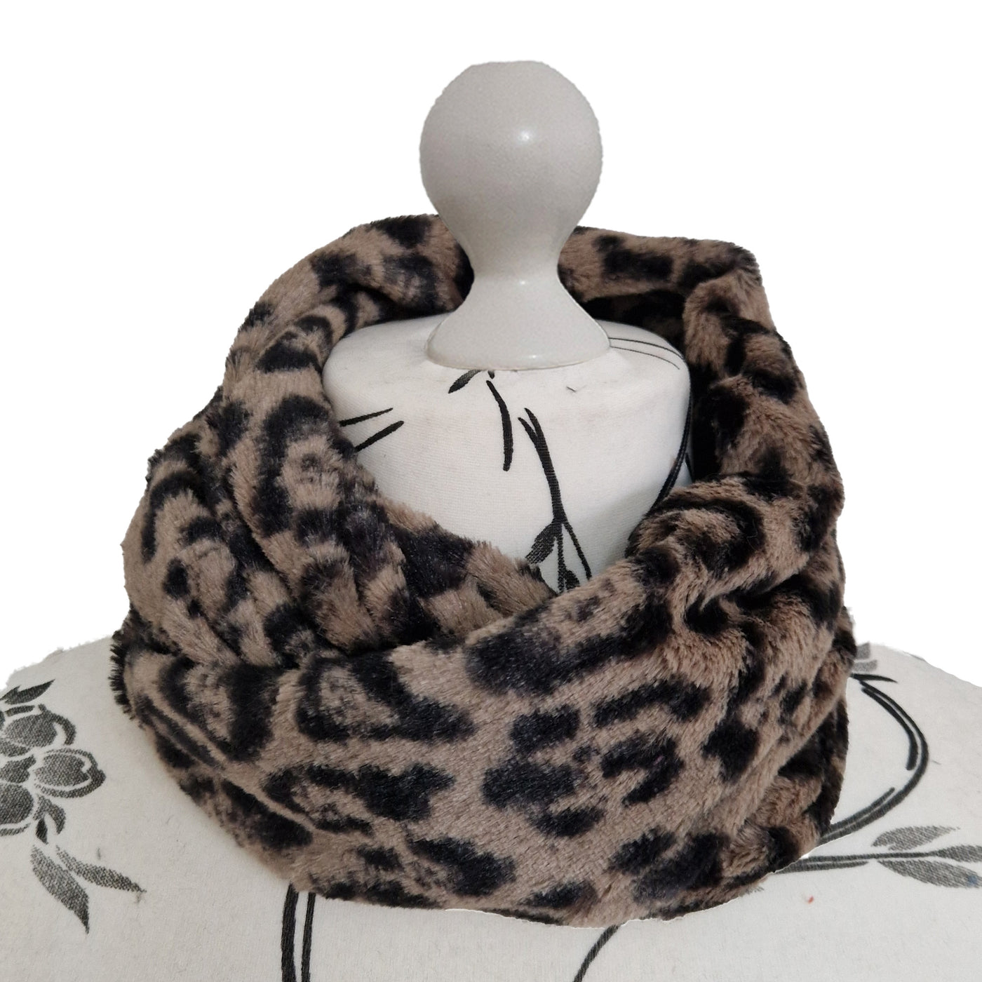 Infinity Scarf handmade from an ultra soft and fluffy microfur leopard print fabric in cream. Wear it long or wrap it around your neck 2-3 times to keep you toasty warm
