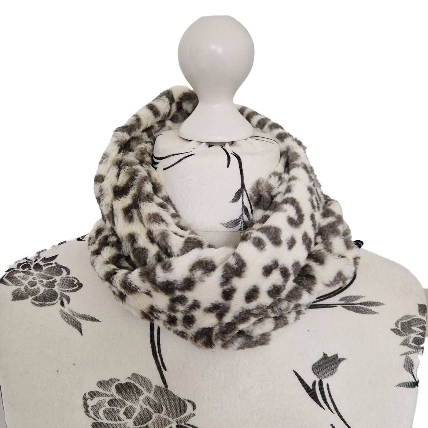 Infinity Scarf handmade from an ultra soft and fluffy microfur leopard print fabric in cream. Wear it long or wrap it around your neck 2-3 times to keep you toasty warm
