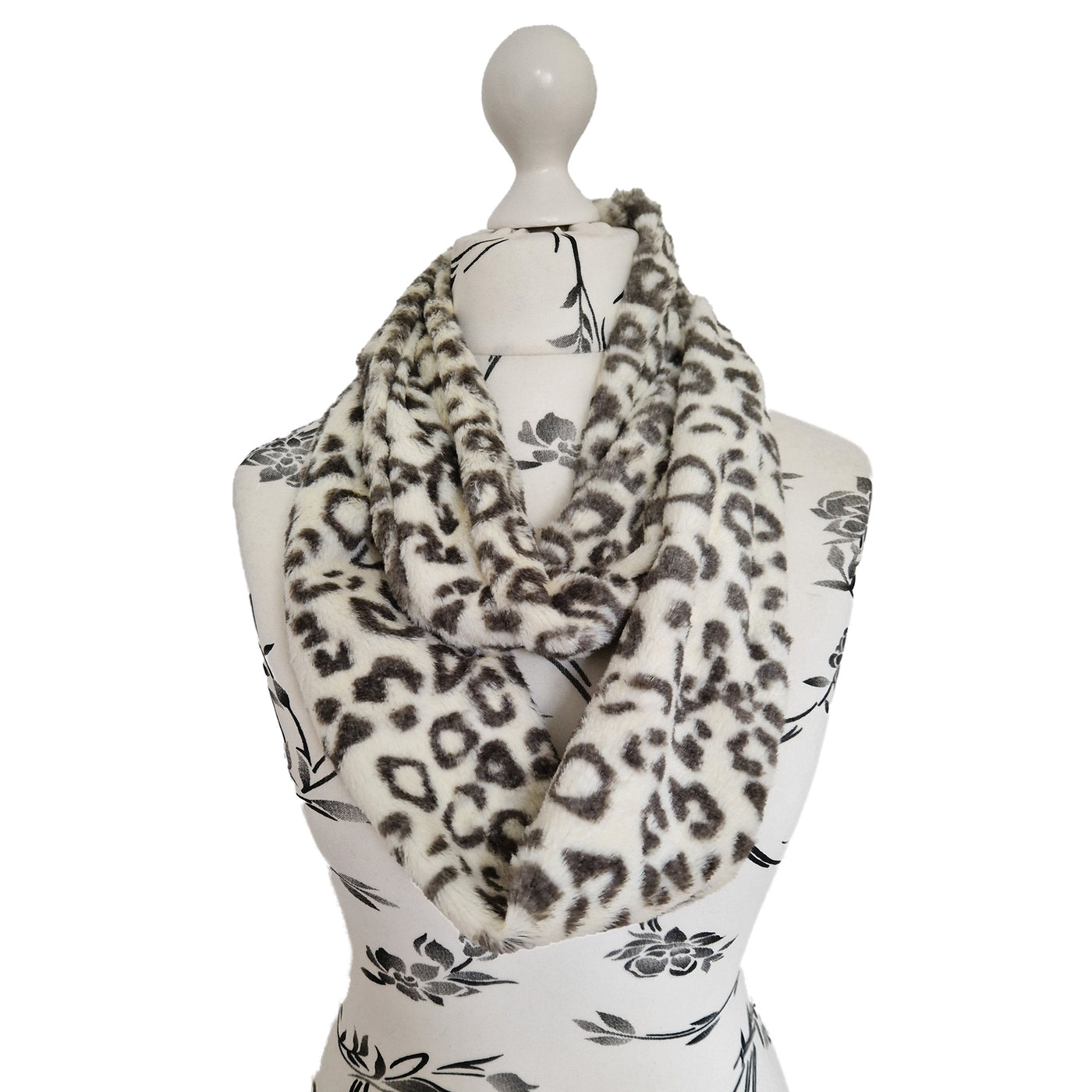 Infinity Scarf handmade from an ultra soft and fluffy microfur leopard print fabric in cream. Wear it long or wrap it around your neck 2-3 times to keep you toasty warm
