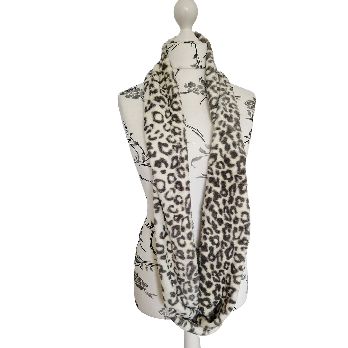 Infinity Scarf handmade from an ultra soft and fluffy microfur leopard print fabric in cream. Wear it long or wrap it around your neck 2-3 times to keep you toasty warm
