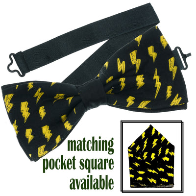 Black Fabric with yellow lightning bolts with rock n roll printed on our pre-tied bow tie & pre-folded pocket square. The bow tie is on a sliding ribbon to easily attach.The pocket square is  pre-folded so just pop it straight in your breast pocket
