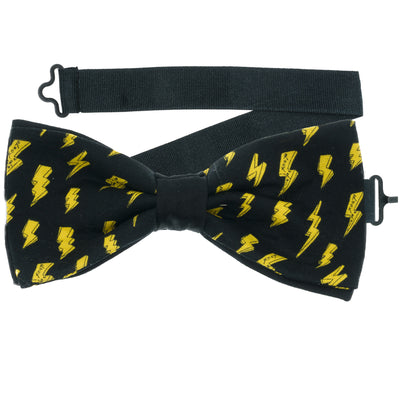 Black Fabric with yellow lightning bolts with rock n roll printed on, pre-tied bow tie which is on a sliding ribbon to easily attach. The pocket square is  25cm x 25cm, pre-folded just pop it straight in your breast pocket Handmade from 100% Cotton
