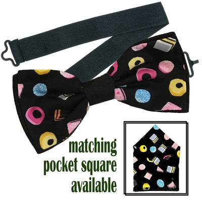 Great retro design with liquorice all sorts design on our handmade pre-tied bow tie & pre-folded pocket square.  The bow tie is on a sliding ribbon to easily place and attach. The pocket square is pre-folded for your pocket. Handmade from 100% cotton

