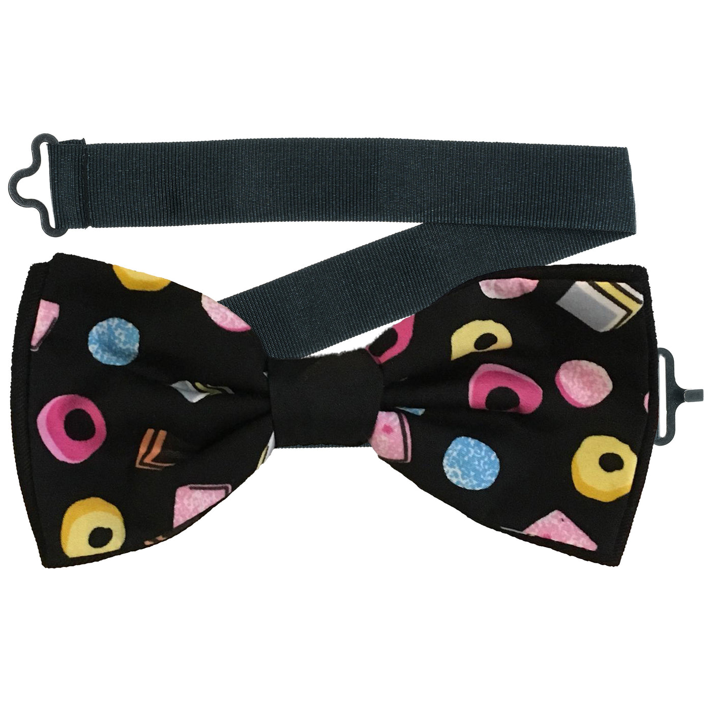 Great retro design with liquorice all sorts design on our handmade pre-tied bow tie which is on a sliding ribbon to easily place and attach. There is also a crocodile clip which can be attached to turn it into a hair bow. Handmade from 100% cotton
