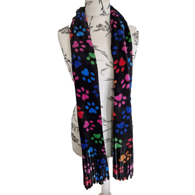 Bright multicoloured paw prints on black fleece fabric in our handmade scarf, approximately 180cm x 28cm with a fringed edge
