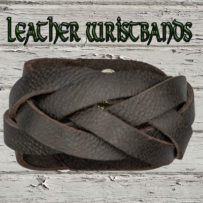 Brown Leather wristband plaited by hand with a 5 strip plait.  The wristband/wrist protector is secured with 2 press studs.  There are 2 size positions.