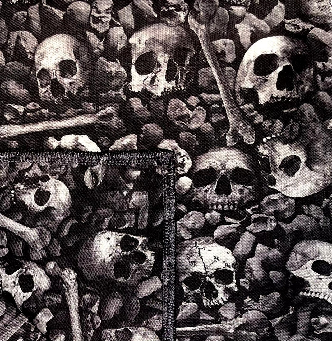 Hundreds of overlapping skulls & bones on more bones on our Square Bandana handmade from 100% cotton, the skulls look very realistic.

