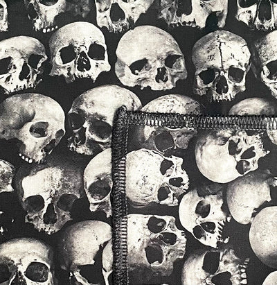 Hundreds of overlapping skulls on our Square Bandana handmade from 100% cotton, the skulls look realistic, very eerie