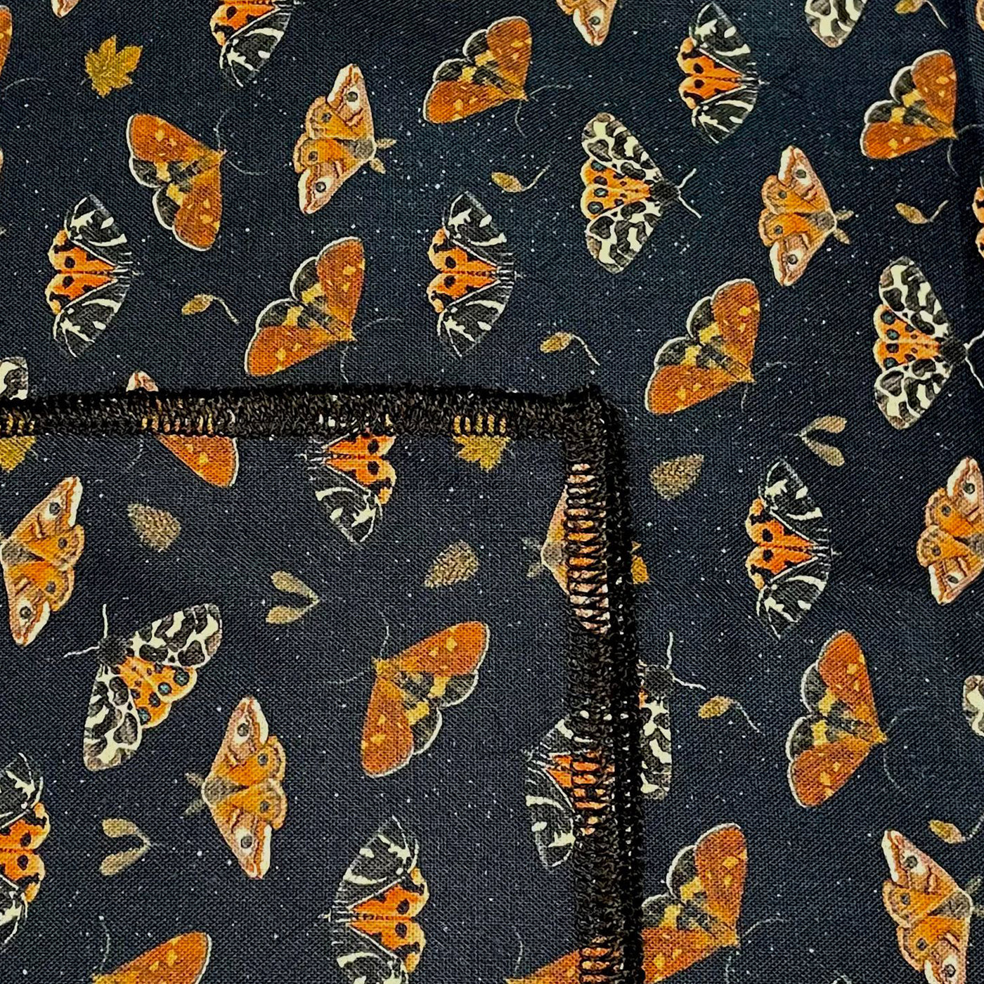 Beautiful fabric covered in tiger moths in various positions with acorns & leaves dotted around.  100% cotton fabric handmade headband