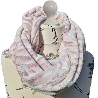 Fleece Snood handmade from an ultra soft and warm fleece. The fabric is a snow tiger design with a subtle shade of pink. No need to wrap around your neck as the snood pops straight over your head immediately toasty warm
