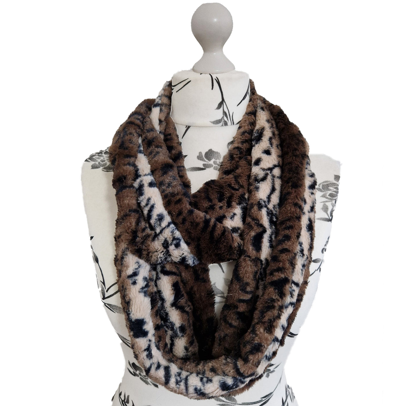 Infinity Scarf handmade from an ultra soft and fluffy leopard  r big cat faux fur fabric in brown & beige with black markings. Wear it long or wrap it around your neck 2-3 times to keep you toasty warm
