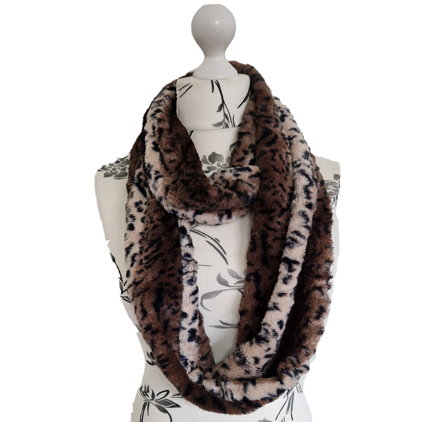 Infinity Scarf handmade from an ultra soft and fluffy leopard  r big cat faux fur fabric in brown & beige with black markings. Wear it long or wrap it around your neck 2-3 times to keep you toasty warm
