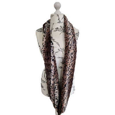 Infinity Scarf handmade from an ultra soft and fluffy leopard  r big cat faux fur fabric in brown & beige with black markings. Wear it long or wrap it around your neck 2-3 times to keep you toasty warm
