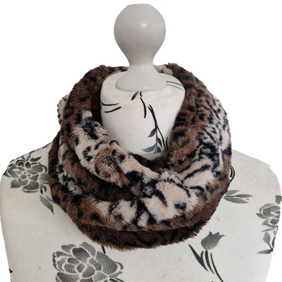 Infinity Scarf handmade from an ultra soft and fluffy leopard  r big cat faux fur fabric in brown & beige with black markings. Wear it long or wrap it around your neck 2-3 times to keep you toasty warm
