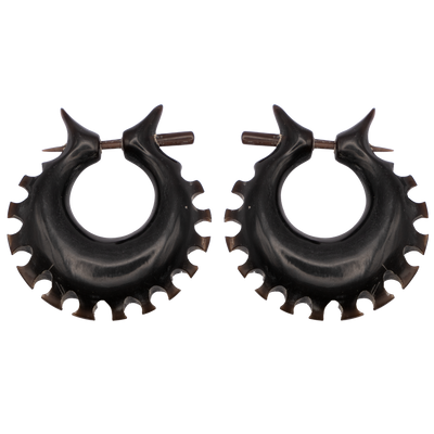 Black wooden circular earrings with a cut out cog shaped edge.  A stick post secures them in place.  Approximately 3.5cm from top to bottom